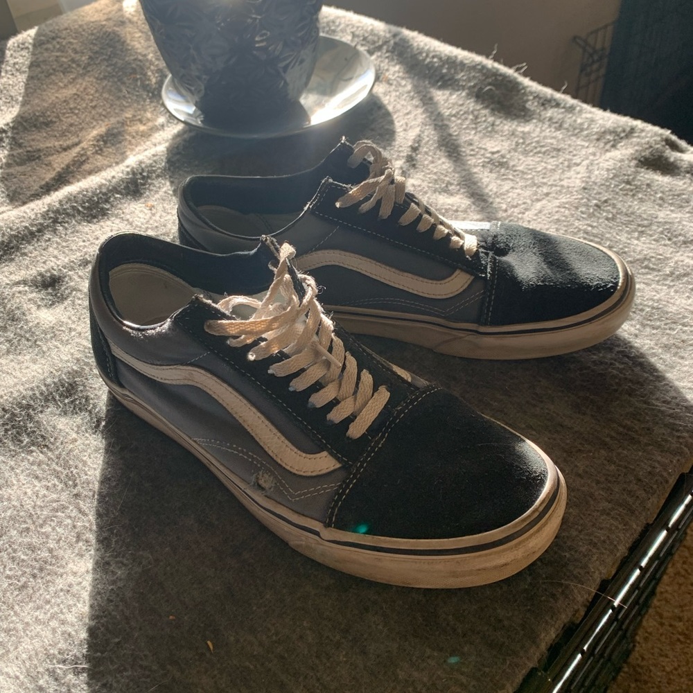 Blue black and white vans
